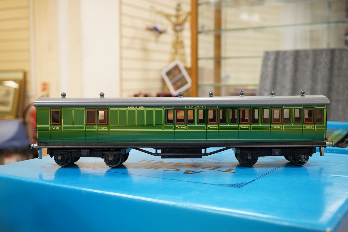 A boxed ACE Trains 0 gauge tinplate coach set; C/1 SR, comprising of three Southern Railway bogie coaches; a Full First, a Full Third and a Brake Third